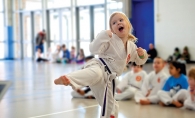 Bellatrix Shamblin performs a kick at Plymouth National Karate School