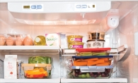 A fridge full of organized groceries