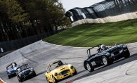 Racers drive classic cars at Road America.