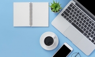 A desk is set up with all of the necessary supplies for working from home.