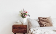 Bouquet of flowers on bedside nightstand