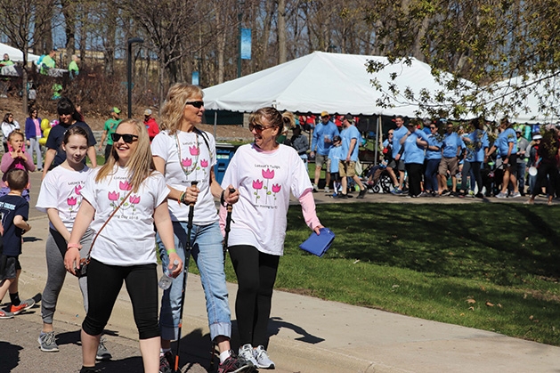 A group of women walk at the Parkinson's Foundation's Moving Day.