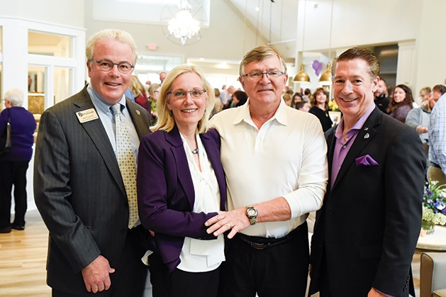  Plymouth city council member Ned Carroll, Karen and Jerry Parks, Mayor Jeff Wosje at the Parks' Place Grand Opening