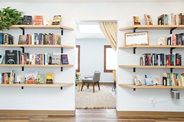 A shot of the bookshelves at Cream & Amber, Hopkins' new book/beer/coffee shop.