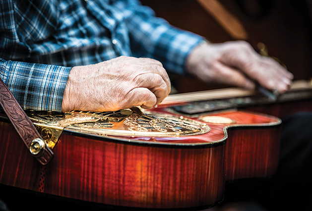 Matthew Johnson playing bluegrass guitar