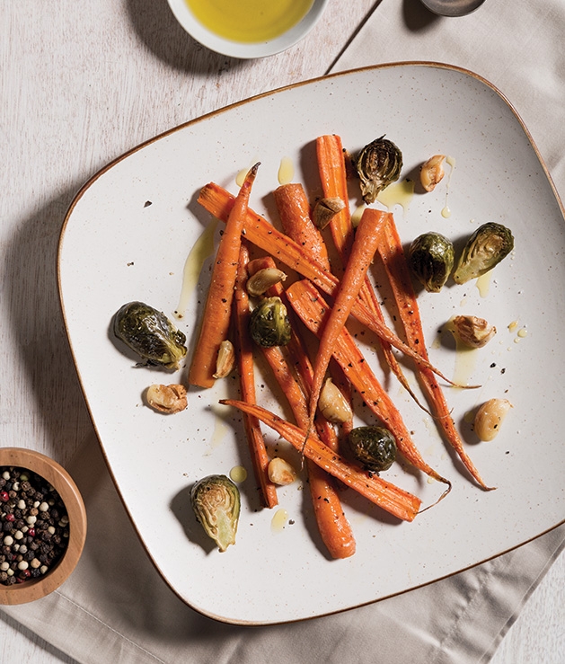 Roasted carrots and brussels sprouts, a Thanksgiving side dish recipe by advisory board member Stuart J. Adelman.