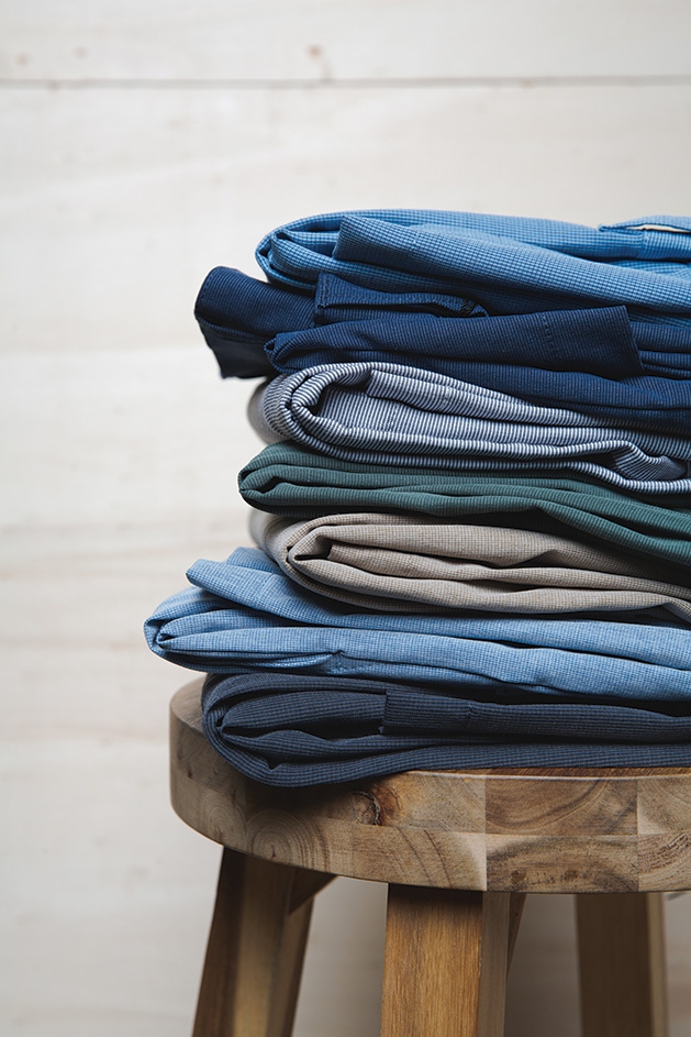 A stack of clothes from The Foursome Fine Menswear