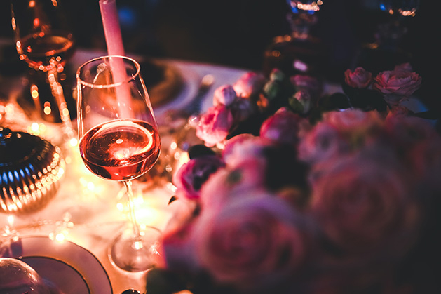 Romantic date night, wine, flowers, candles