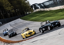 Racers drive classic cars at Road America.